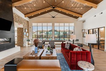 Clubhouse great room with fireplace & large windows